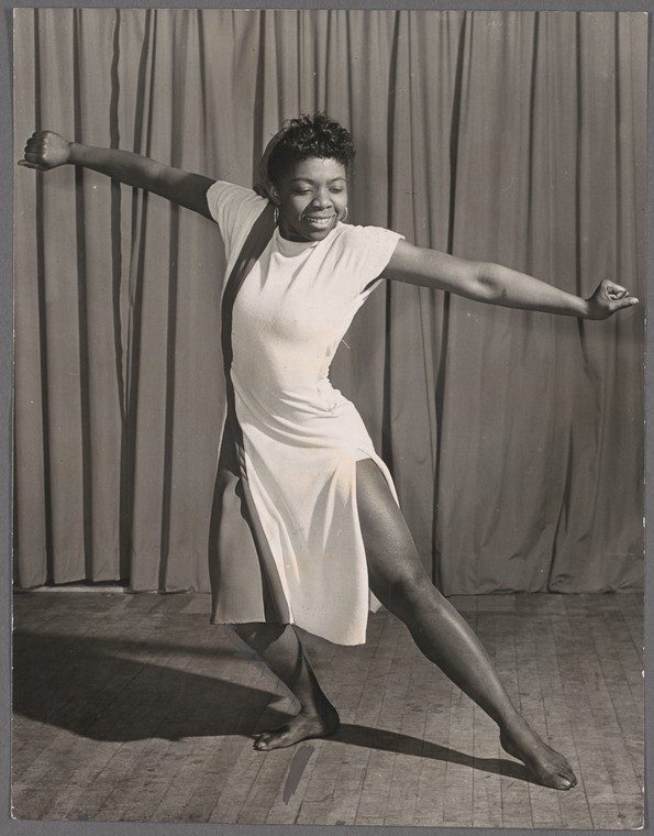 woman with outstretched arms dancing