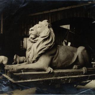 Historic photo of marble lion in sculptor’s studio
