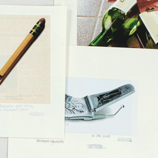 Selected closeups of images including a broken flip phone, a pencil, and a wine bottle.