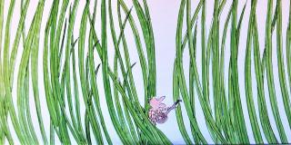 A cartoon of a character with a guitar peeking out from long grasses.